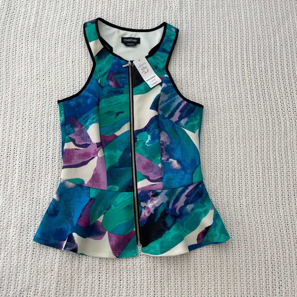 bebe peplum bodycon top. NWT